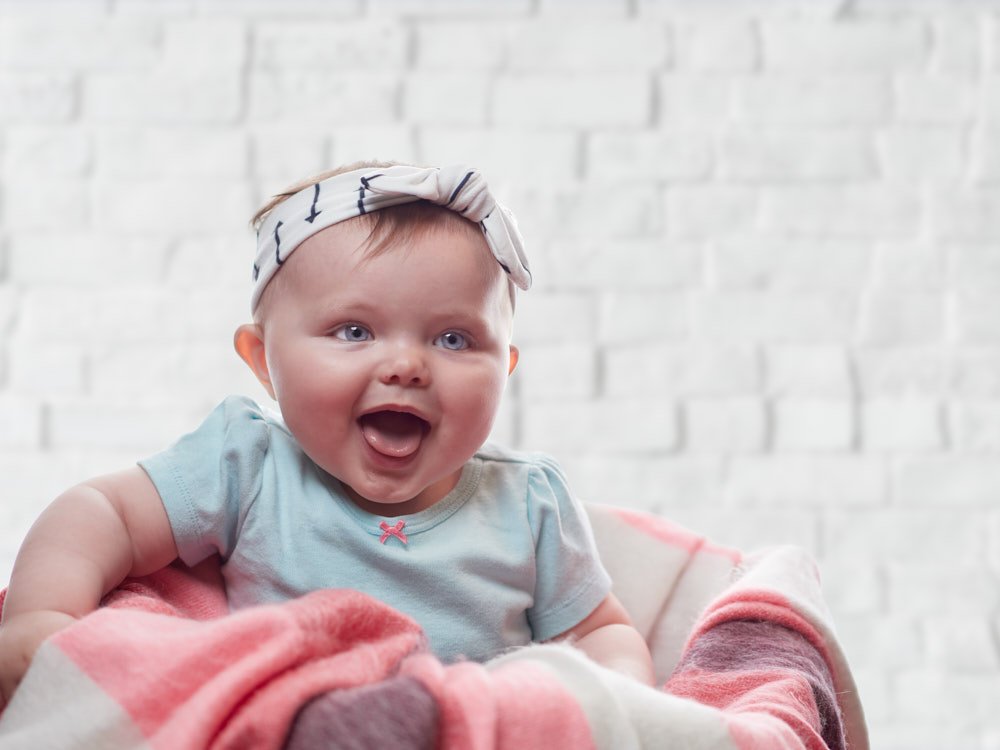 Little 8-month old Callie is all smiles
